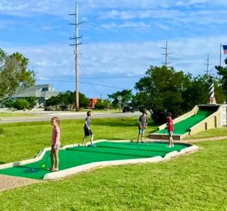 Enjoy a round of miniature golf. 